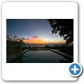 Coral Estate - Ferienhaus - Sonnenuntergang am eingenen Pool